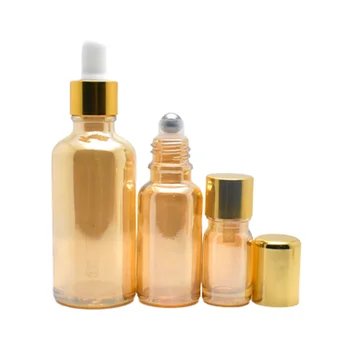 Кехлибар-златни стъклен флакон за ароматна опаковката Флакон козметични валяк флакон-краен за тонер със златна капачка и парфюмни етерични масла
